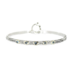 Pulsera de Plata y Oro con Topacio Rojo